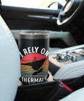 Hang Gliding Themed Stainless Steel Insulated Tumbler on car console, black with hang glider graphic and text. Perfect for enthusiasts.