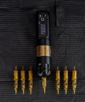 Tattoo Cartridges No 8 Bugpin 11RL Needle Set Disposable 20Pcs displayed with rotary tattoo machine, top view.