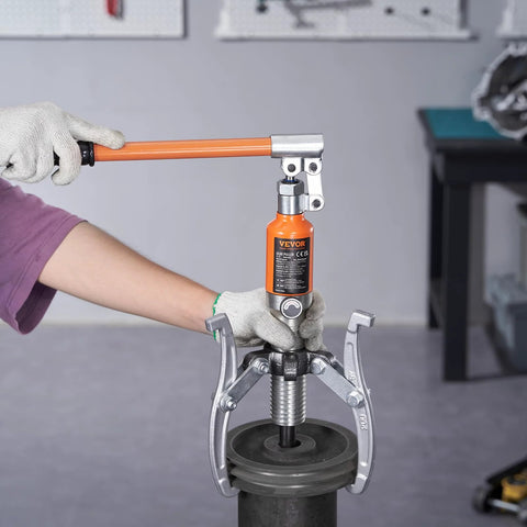 VEVOR hydraulic gear puller with orange handle and silver jaws for pulling wheel hubs
