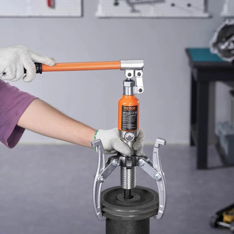 Hydraulic Gear Puller Kit With 5 Ton Capacity And 8 Inch Jaw in use, showing 2 jaw configuration for machine repair.