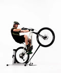 Rider using Bike Balance Trainer for Trail Ready Balance Drills, building core strength and quick reaction time indoors.