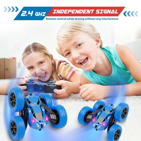 Kids playing with 2.4GHz RC Car With 360 Degree Double Sided Flips 4WD Off Road Dope Stunt Truck Built For Kids Aged 6 To 12