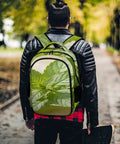 Man wearing Green Mint Herb Printed Unisex Backpack With Large Capacity, Casual Daypack For School, Work And Travel, outdoor setting