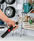 All-in-One Hydraulic Brake Line Flaring Tool Kit for 3/16 to 1/2 Inch Copper and Steel Tubing, shown in hand in a garage setting