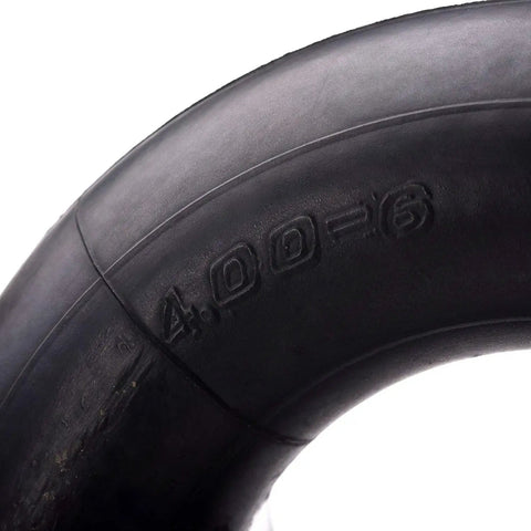 Close-up of Beefed Up Heavy Duty Inner Tubes 13x4.00-6 for 6 inch rims showing tire markings. TR-13 Straight Valve Stem.