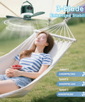 11 Inch Wireless Portable Camping Fan With Light And Remote 10040mAh Battery hanging above a woman relaxing in hammock