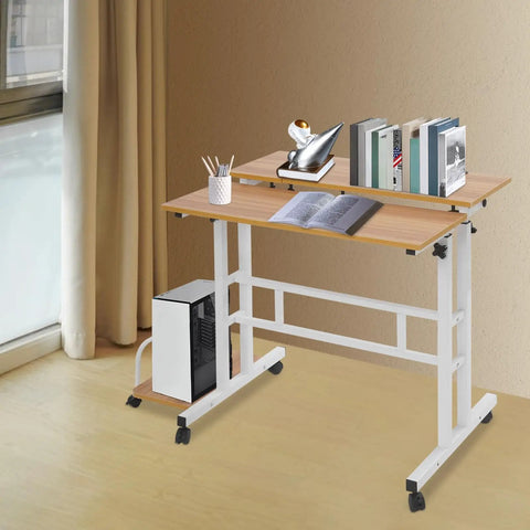 Effortless Folding Standing Desk With Smooth Rolling Casters And Tilted Writing Panels For Total Flex Work From Home Setup Featuring Quick Height Adjustments In Modern Light Walnut And White, showcasing a compact design with books and decor.