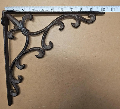 Heavy Duty Cast Iron Shelf Bracket Set With Ornate Fleur De Lis Pattern 10 By 10 Inch in satin brown, top view with ruler