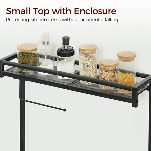 Small top with enclosure on Rustic Brown And Black Bakers Rack With Storage And Microwave Stand, holding jars and spices.