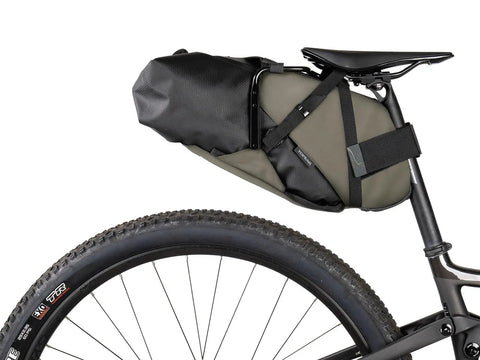 BackLoader X Bike Bag 15L for Bikepacking in Green, Waterproof 10,000 Mm Rating, mounted on bike, side view