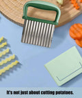Green stainless steel crinkle cutter with handle and protective case for vegetables