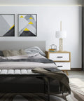 Modern bedroom with grey bedding, geometric art, and a dresser accented by "Matte Black Cabinet Handles Set Of 2 Stainless Steel Square Bar Pulls For Drawers And Dressers."