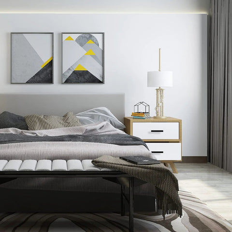 Modern bedroom with grey bedding, geometric art, and a dresser accented by "Matte Black Cabinet Handles Set Of 2 Stainless Steel Square Bar Pulls For Drawers And Dressers."