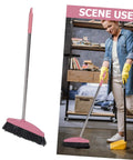 Heavy Duty Pink Broom With Extended Handle Sweeps Indoors And Outdoors, used for cleaning floors in a home setting.
