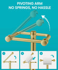 Heavy Duty Freestanding Toilet Paper Holder Stand In Matte Gold Frame with pivoting arm for easy roll swaps.