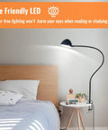 Gooseneck Clip Desk Lamp With Clamp, 10W 1100 Lumens, 31 Inch Flexible Arm, USB Powered next to a bed and nightstand.
