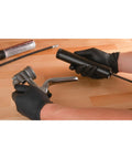 18 Inch Flex Grease Gun Hose Extension with 4500 PSI, black hose on table with metal coupler and grease gun handle