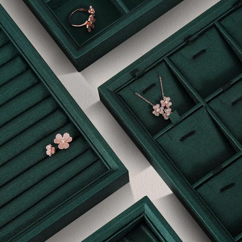 Top Tier PU Leather Jewelry Display Tray Featuring Twenty Four Secure Grid Slots For Rings Earrings And Brooches with floral jewelry.