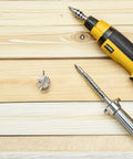 80 Piece Retro Mini Cabinet Pull Handles Rings With Drop Bail Knobs beside drill on wooden surface.