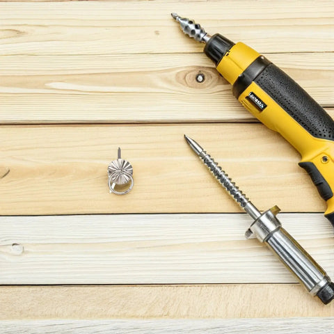 80 Piece Retro Mini Cabinet Pull Handles Rings With Drop Bail Knobs beside drill on wooden surface.