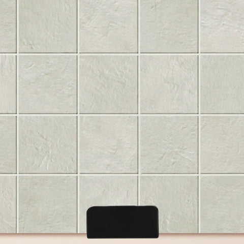 Heavy Duty Black Stainless Steel Tile Display Hangers mounted on a textured light-colored tile surface.