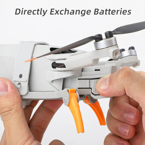 30cm Height Landing Gear For Mini 4 Pro Drone Lightweight Orange Quick Release Height Extender being attached.