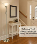 72 Inch Torchiere Floor Lamp With Brushed Nickel Finish And White Alabaster Glass Shade in a stylish entryway corner