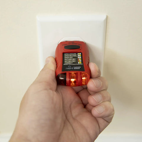 Person using GFCI Ground Fault Receptacle Tester And Circuit Analyzer For 110 To 125V AC Outlets And Extension Cords