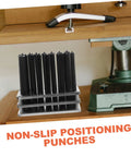Essential Cylindrical Punch Set For Woodworking And Metalworking, shown on workbench with press tool, ergonomic hand tools