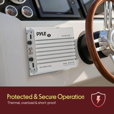 Hydra Marine 400W 4 Channel Amplifier Waterproof installed on boat dashboard near steering wheel for secure audio operation