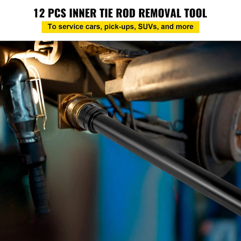 Inner tie rod removal tool, black steel, installed in a vehicle's tie rod end