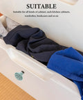 Image showing an Antique Blue Ceramic Cabinet Door Knob from the set, installed on a partially open drawer with clothing spilling out.