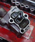 Close-up of Honda Solenoid Gasket And Spool Valve Filter Screen Replacement For CRZ 2011 2016 And Fit 2009 2013 Black Pack Of 1 OE 15825 RB0 003