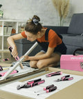 Person using Pink 75-Piece Tool Set With Rotatable Cordless Screwdriver 3.7V, 13 Inch Portable Steel Toolbox for home DIY project