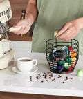 Large Capacity Black Wire Coffee Pod Holder With Wooden Base, Modern Basket Style For Keurig, Dolce Gusto, VertuoLine And Nestle Original Pods on counter