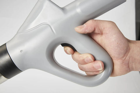Close-up of hand gripping High Pressure Air Drain Plunger For Quick Toilet Clogs And Drain Unclogging Easy To Use No Plumber Needed