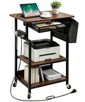 Slick Rolling Three Tier Coffee Station Cart With Built In Power Panel And Roomy Storage Shelf For Mastering Your Daily Grind And Charging Tech Without Hassle, showing printer and tablet.