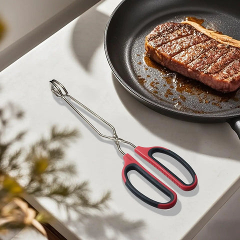 Stainless Steel Scissor Tongs Set With 10 Inch And 12 Inch Tongs, 2 Piece Kitchen Tool For Pro Grade Cooking, Grilling, Food Prep, And Serving, Heavy Duty 304 Stainless Steel, Dishwasher Safe, Rust Resistant, scissor tongs beside a steak pan