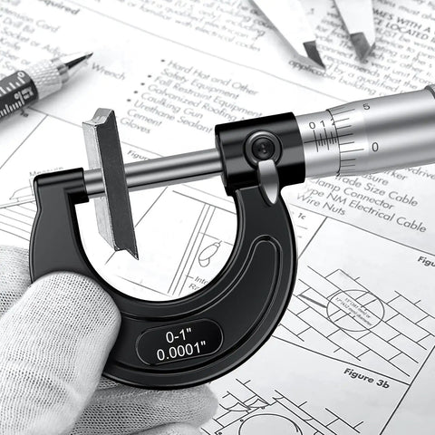 Pro Grade Outside Micrometer 0-1 Inch Range With 0.0001 Inch Precision Machinist Tool, black finish, on engineering blueprint