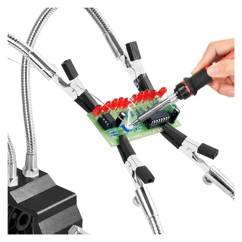 Four Arm Third Hand Soldering Station With Flexible Gooseneck Arms Holding PCB for Precision Soldering on Workbench