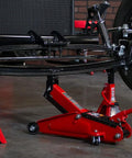 Torin Hydraulic Trolley Floor Jack 2.5 Ton Capacity With Blow Mold Carrying Case, heavy duty steel lifting vehicle in garage