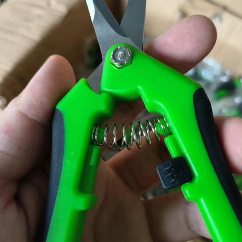 Close-up of green-handled 1 Pack Garden Scissors And Shears 6.4 Inch Steel Pruners For Plants Flowers Weeds Fruit Trees And Vegetables