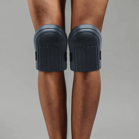 Built Tough Four Pack Black Heavy Duty Knee Pad Inserts For Work Pants Anti Slip Grip Breathable Padding Real Deal Protection For Mechanics Construction And Yard Labor No Sweat Required on a pair of knees.