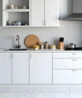 Modern kitchen with white cabinets featuring 20 Pack 3 Inch Hole Center Solid Kitchen Cabinet Handles in Polished Chrome, zinc alloy finish.