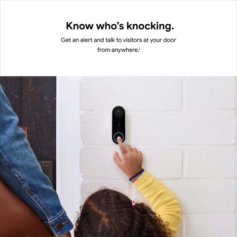Child reaching to press Wired Video Doorbell Cam With Always On Streaming HDR Video Night Vision And Two Way Talk For Your Front Door Real Time Person Alerts Easy Setup Works With Your Smart Home Devices Secure Home Monitoring installed on white brick wall