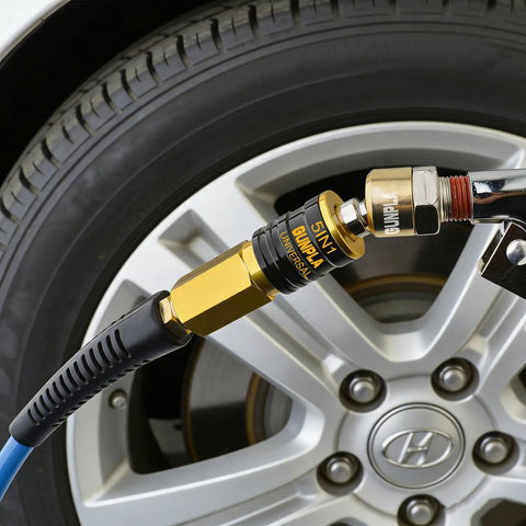 Five In One Universal Quick Connect Air Coupler For Industrial Air Compressors One Quarter Inch NPT Fittings in use on car tire
