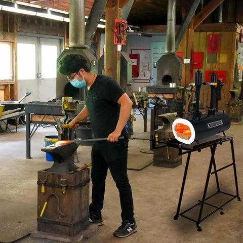 Portable Propane Blacksmith Forge With Beefy Double Burner 2600F Rated For Knife Making in use by blacksmith in workshop