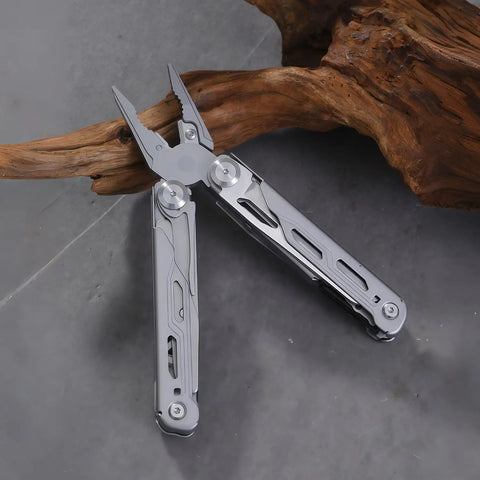 All In One Multitool Pliers With Replaceable Wire Cutters And Glass Hammer Premium Steel Construction on stone surface