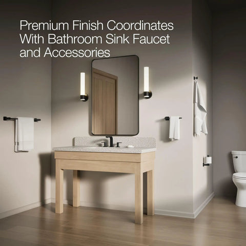 Bathroom with sink, mirror, and Cimarron Left Hand Toilet Trip Lever In Matte Black For Comfort Height Toilets visible on the right.