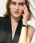 Premium Slim Genuine Leather Apple Watch Band With Chic Bee Charms Easy Snap Fit, worn by a woman in a stylish black blazer.